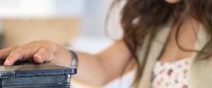 Health conscious woman using a blender