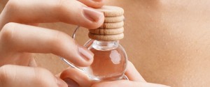 beautiful woman holding oil jar
