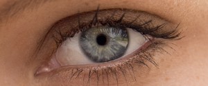 Woman applying concealer